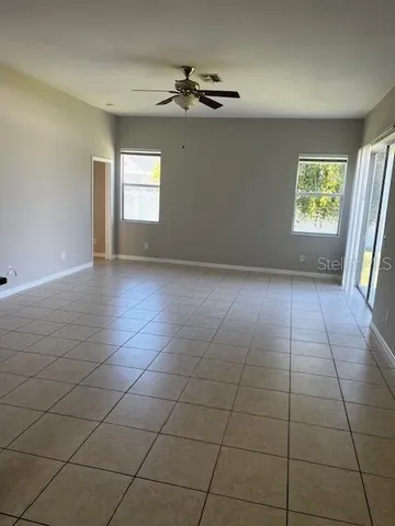 a view of an empty room and window