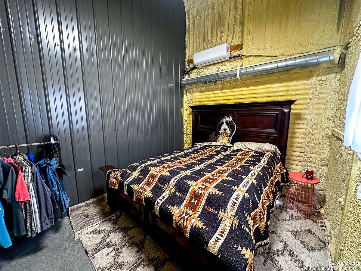 Tbd Marvin Road Comstock, TX 78837 - Photo 12 of 38 a bed sitting in a bedroom next to a window