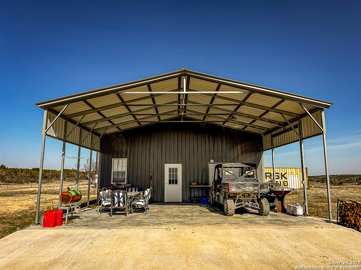 Tbd Marvin Road Comstock, TX 78837 - Photo 13 of 38 a view of a chairs and table in patio