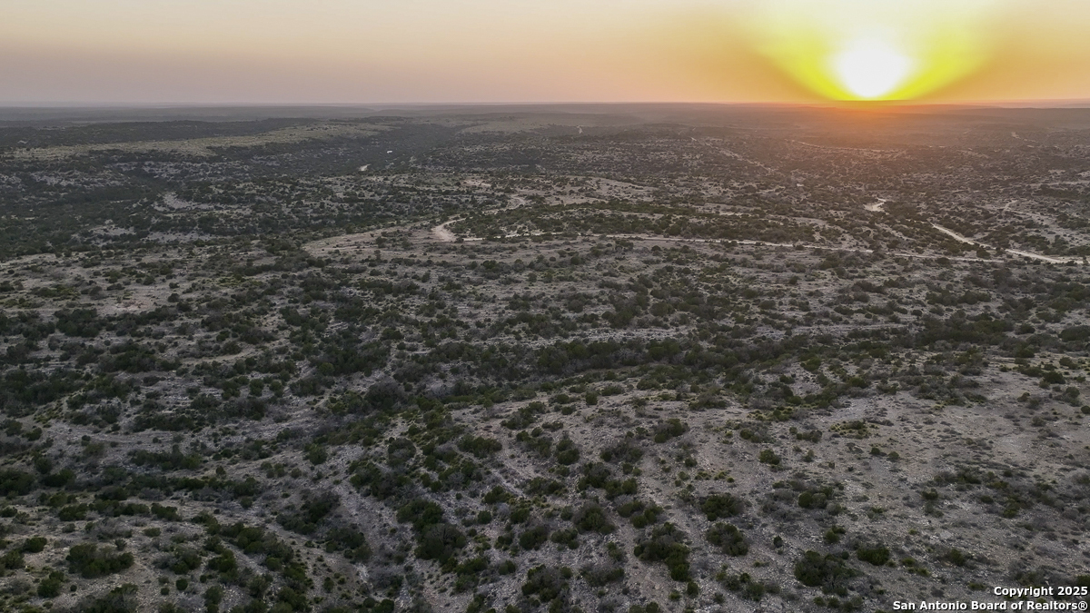 Tbd Marvin Road Comstock, TX 78837 - Photo 2 of 38 an aerial view of house with yard and mountain view in back