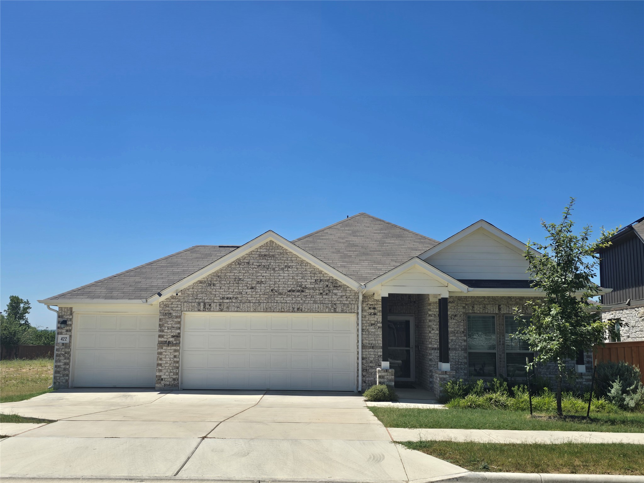 422 Backstays Loop Kyle, TX 78640 - Photo 1 of 1 A spacious driveway with extra parking leads to this classic 3-sides brick home in Crosswinds.