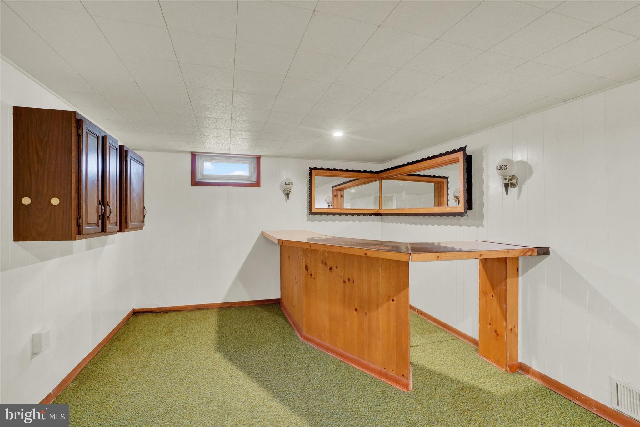 821 Gunnison Road York, PA 17404 - Photo 19 of 28 a view of a hallway with wooden floor and a dresser
