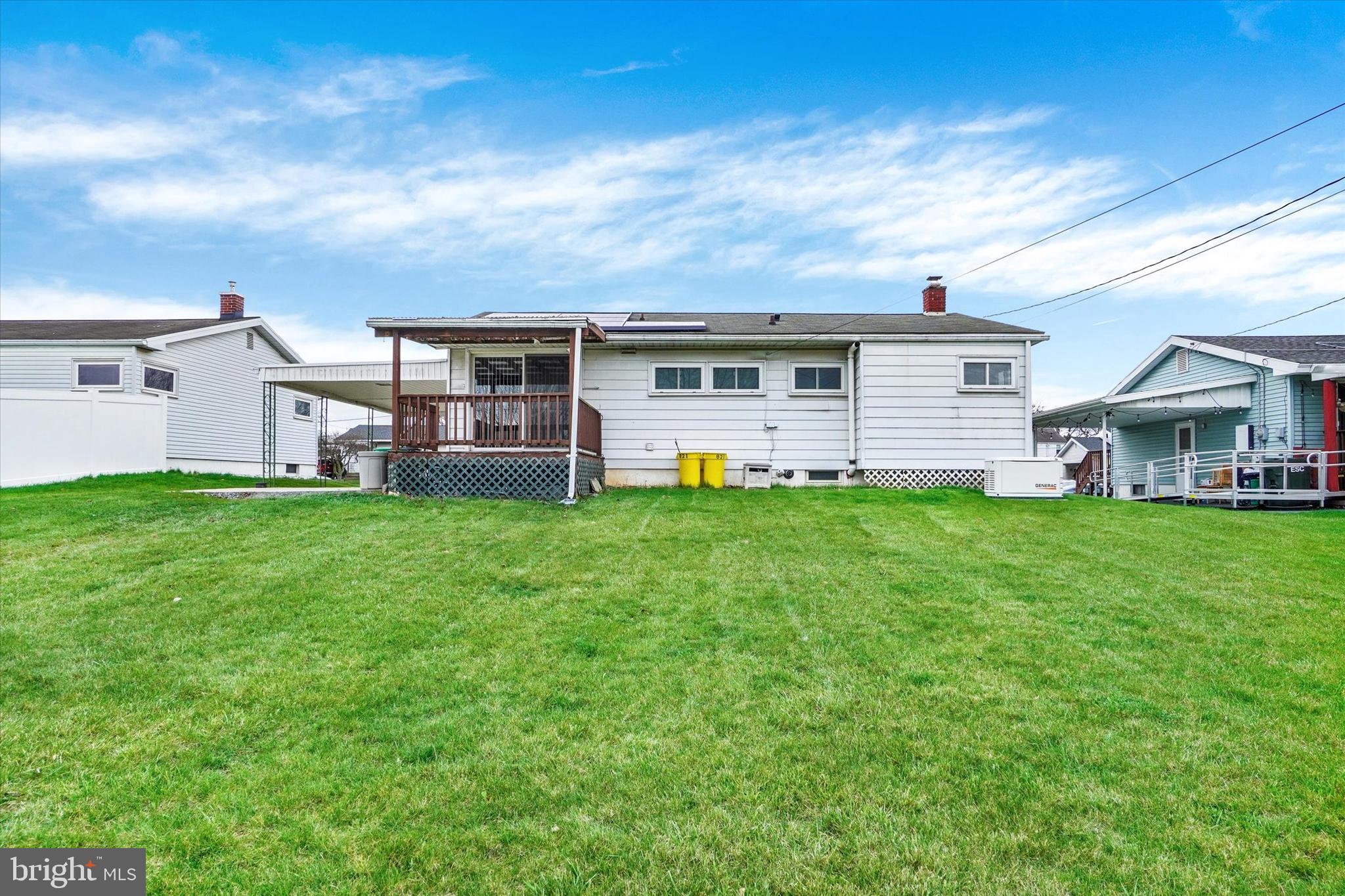 821 Gunnison Road York, PA 17404 - Photo 25 of 28 a view of a house with a yard and sitting area