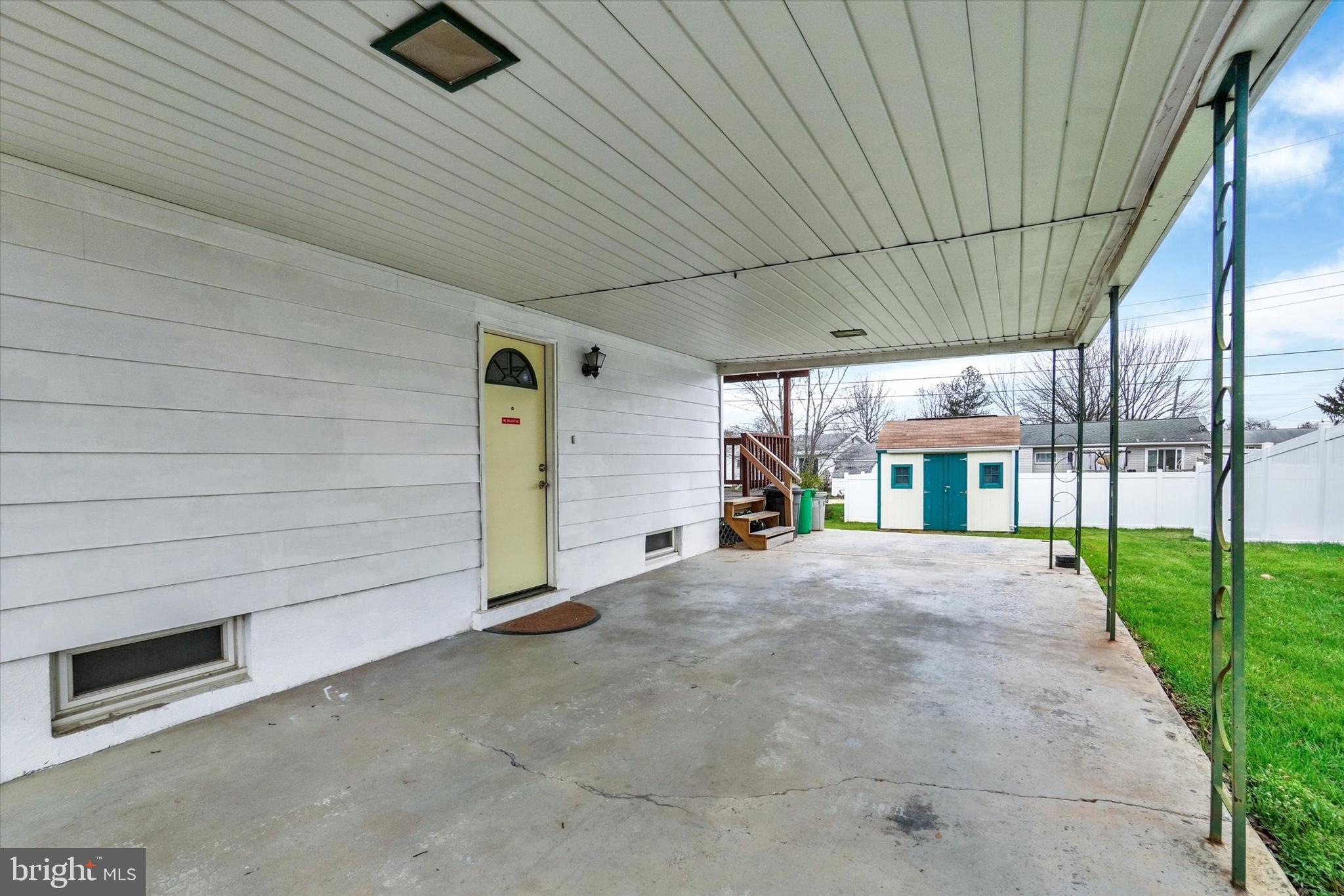 821 Gunnison Road York, PA 17404 - Photo 3 of 28 a view of a house with a backyard and garage