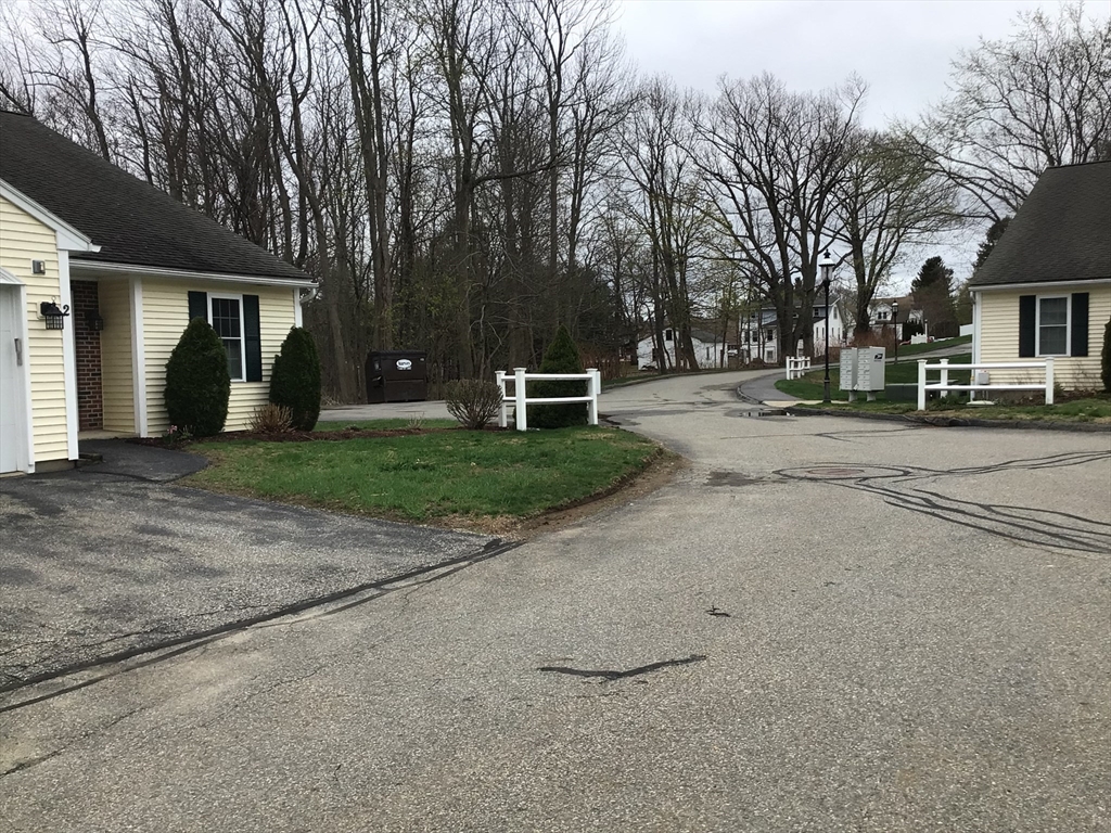 4 Village Way, Unit 4 Rutland, MA 01543 - Photo 2 of 33 a view of a house with a outdoor space