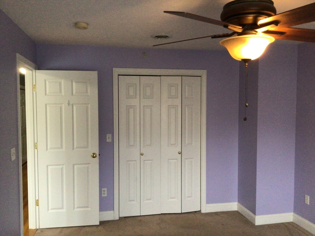 4 Village Way, Unit 4 Rutland, MA 01543 - Photo 23 of 33 a view of a hallway