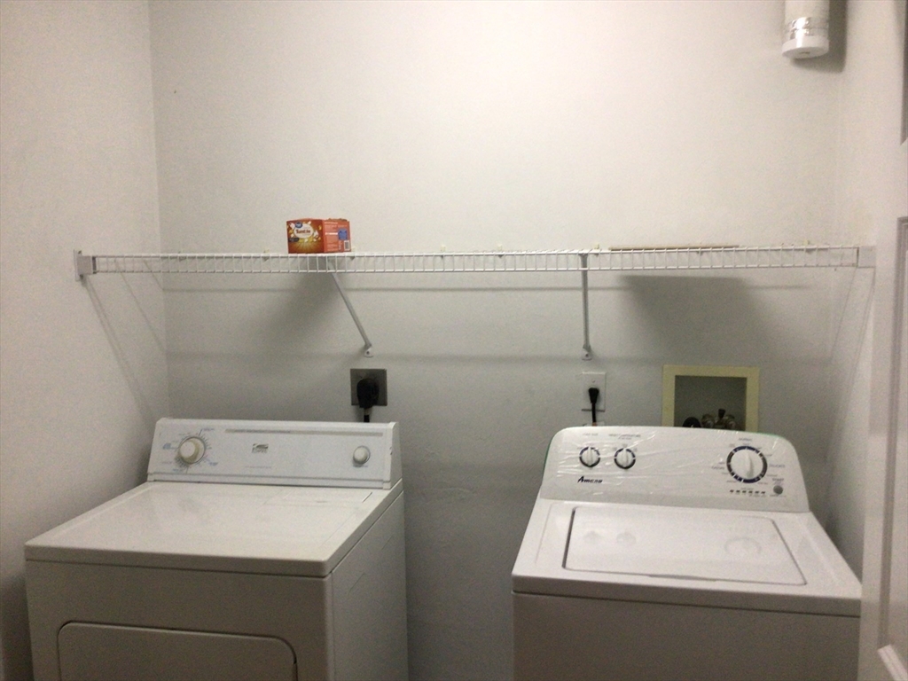 4 Village Way, Unit 4 Rutland, MA 01543 - Photo 24 of 33 a utility room with dryer and washer