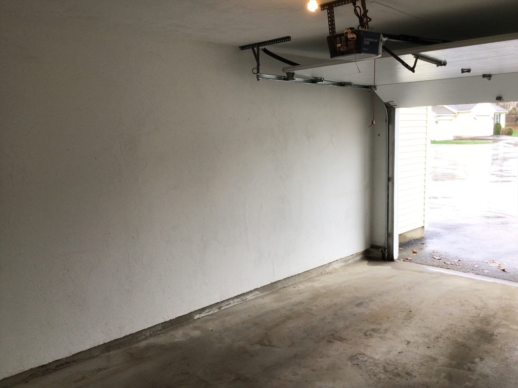4 Village Way, Unit 4 Rutland, MA 01543 - Photo 31 of 33 a view of a room with gym equipment