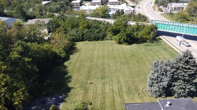 an aerial view of a house having yard