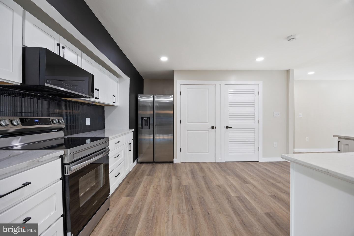 13203 Clarington Court Laurel, MD 20708 - Photo 7 of 25 Modern kitchen with sleek finishes.