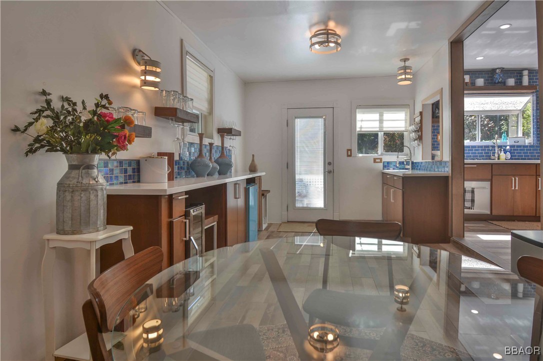 381 Maple Drive Lake Arrowhead, CA 92352 - Photo 14 of 26 a view of a living room and dining room