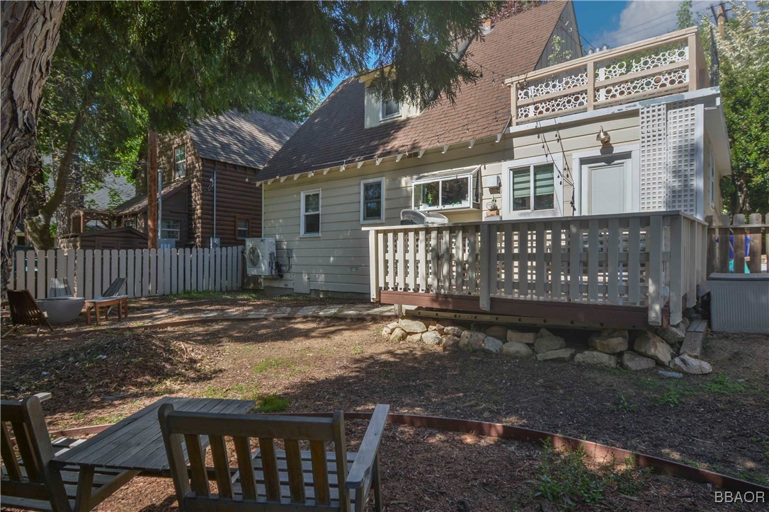 381 Maple Drive Lake Arrowhead, CA 92352 - Photo 19 of 26 a view of a house with backyard and sitting area