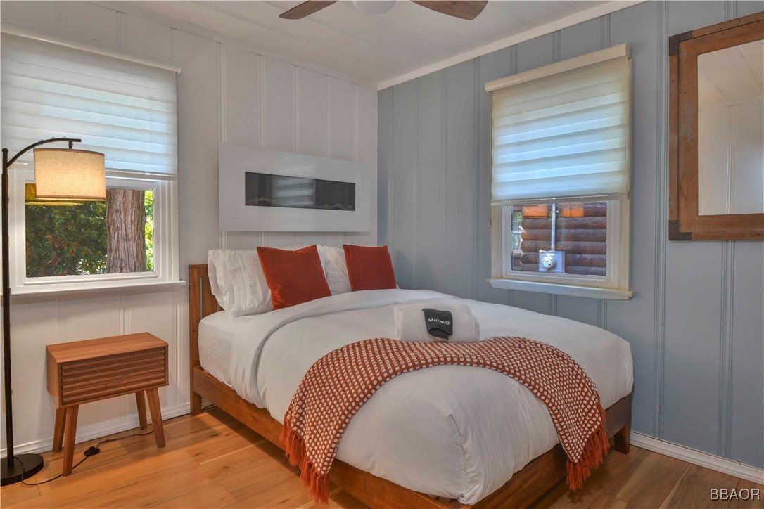 381 Maple Drive Lake Arrowhead, CA 92352 - Photo 8 of 26 a bedroom with a bed and window