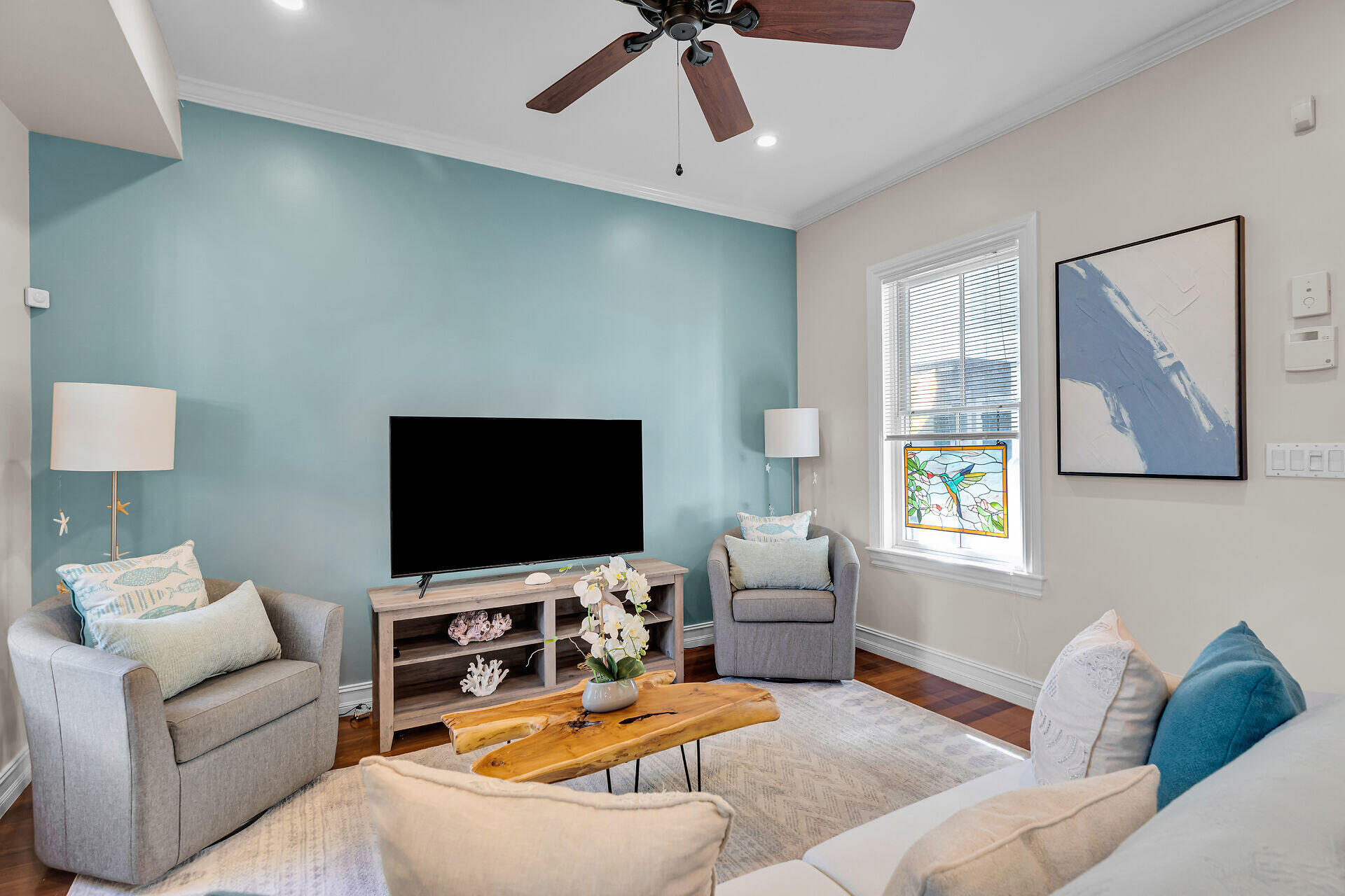 713 Emma Street, Unit 1 Key West, FL 33040 - Photo 11 of 42 a living room with furniture and a flat screen tv