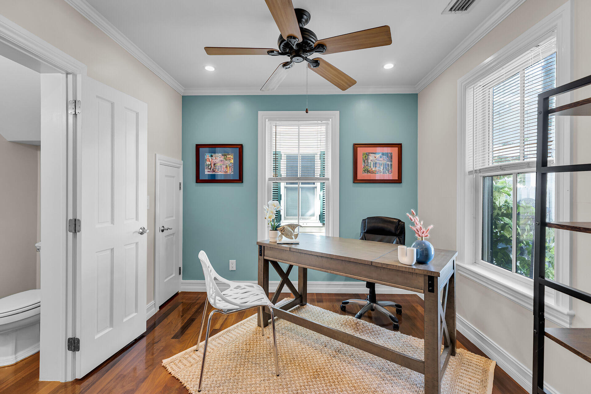 713 Emma Street, Unit 1 Key West, FL 33040 - Photo 18 of 42 a work room with furniture and a window