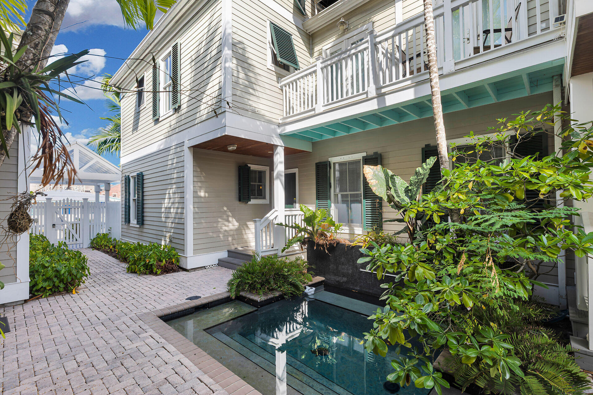 713 Emma Street, Unit 1 Key West, FL 33040 - Photo 2 of 42 front view of a house