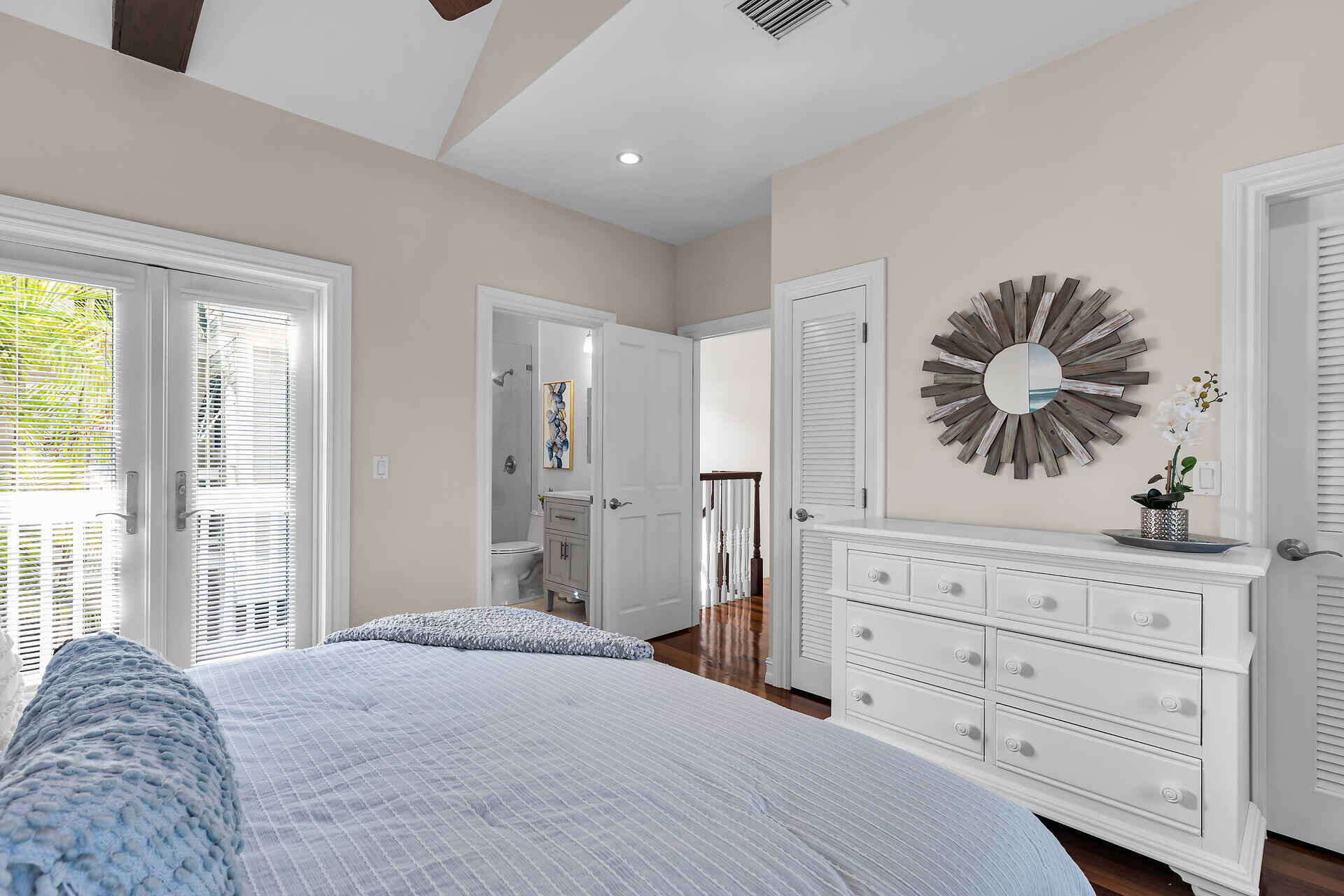 713 Emma Street, Unit 1 Key West, FL 33040 - Photo 24 of 42 a bedroom with a bed and a window