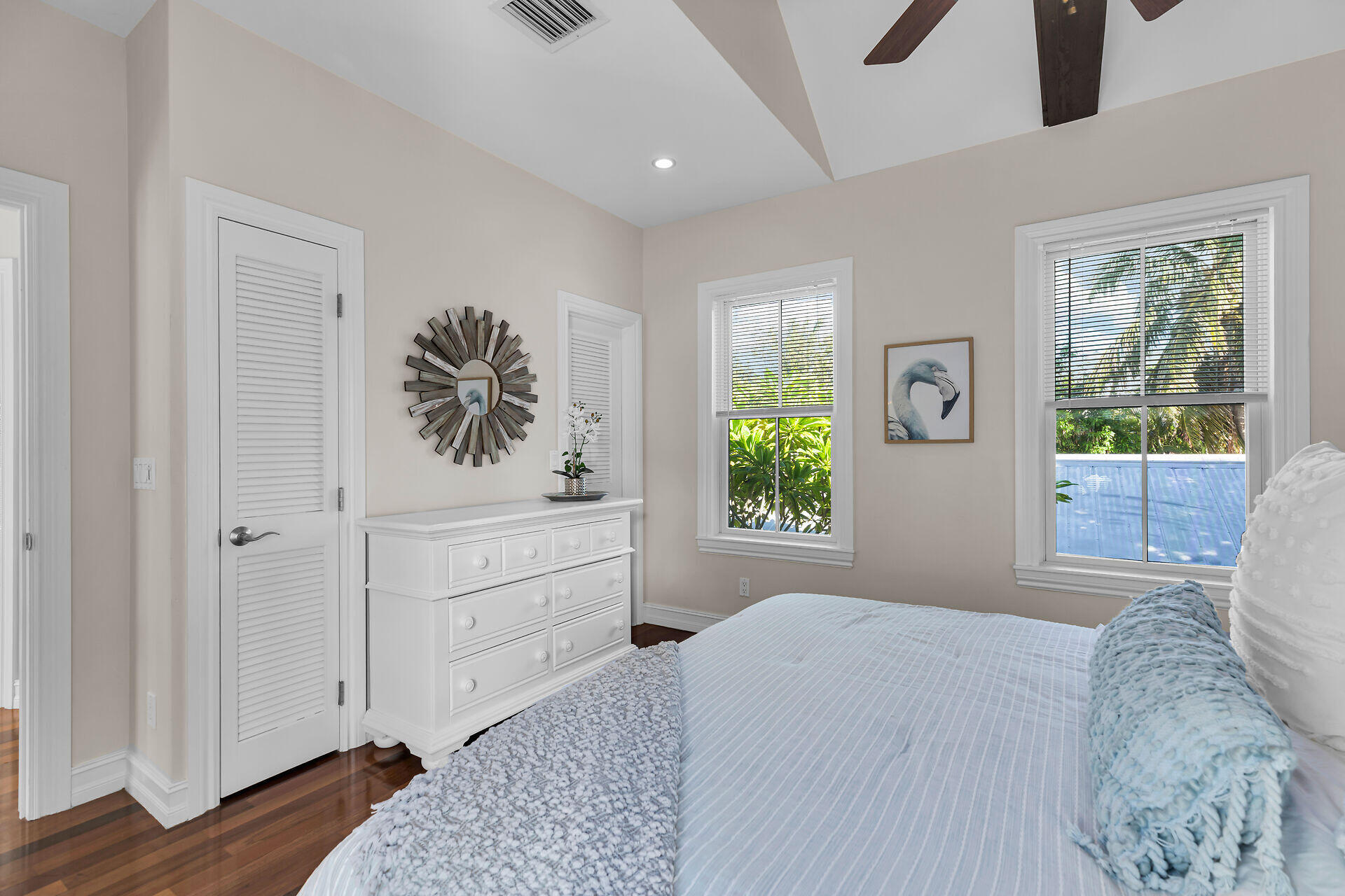 713 Emma Street, Unit 1 Key West, FL 33040 - Photo 27 of 42 a bedroom with a bed and a window