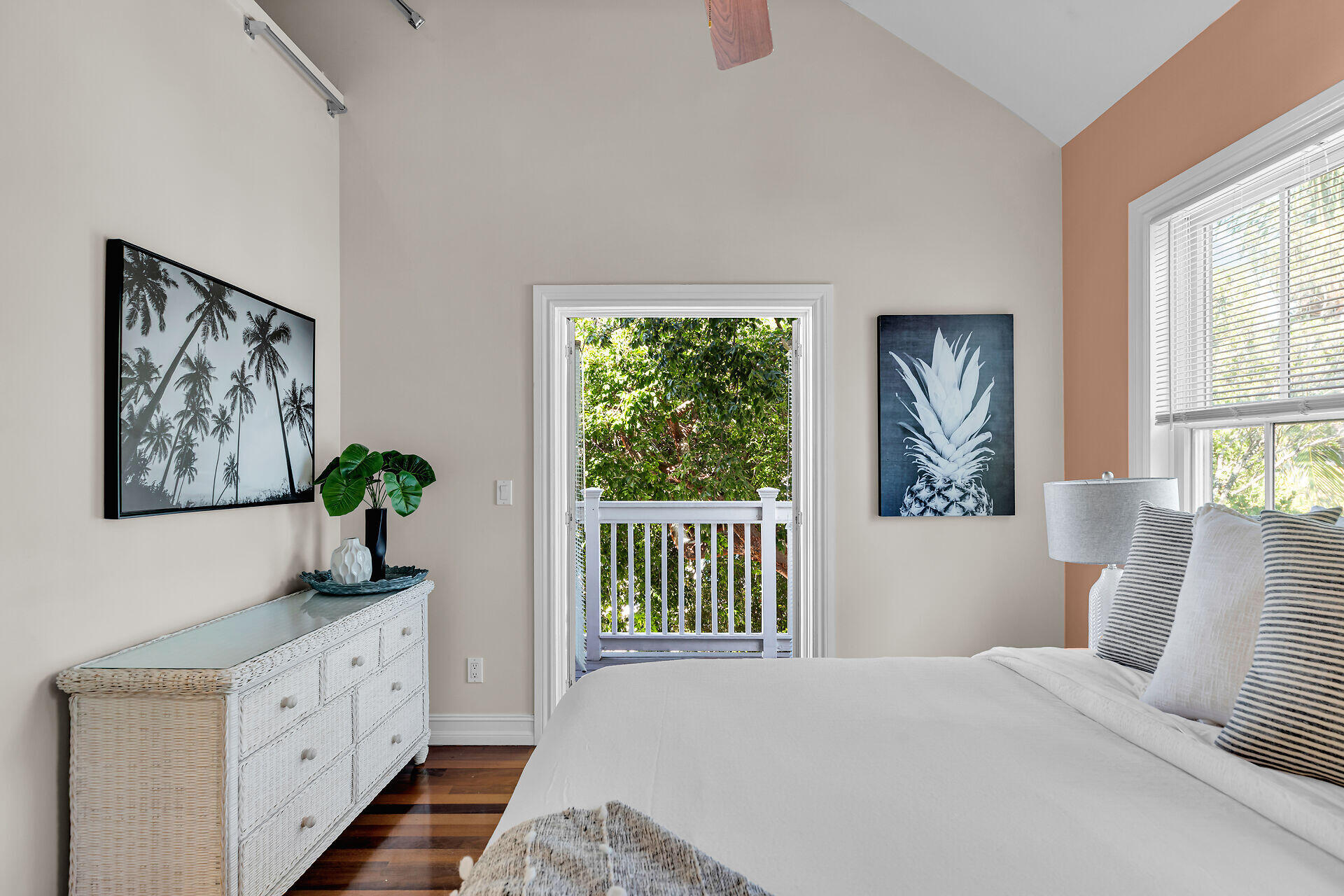 713 Emma Street, Unit 1 Key West, FL 33040 - Photo 32 of 42 a bedroom with a large bed and a window