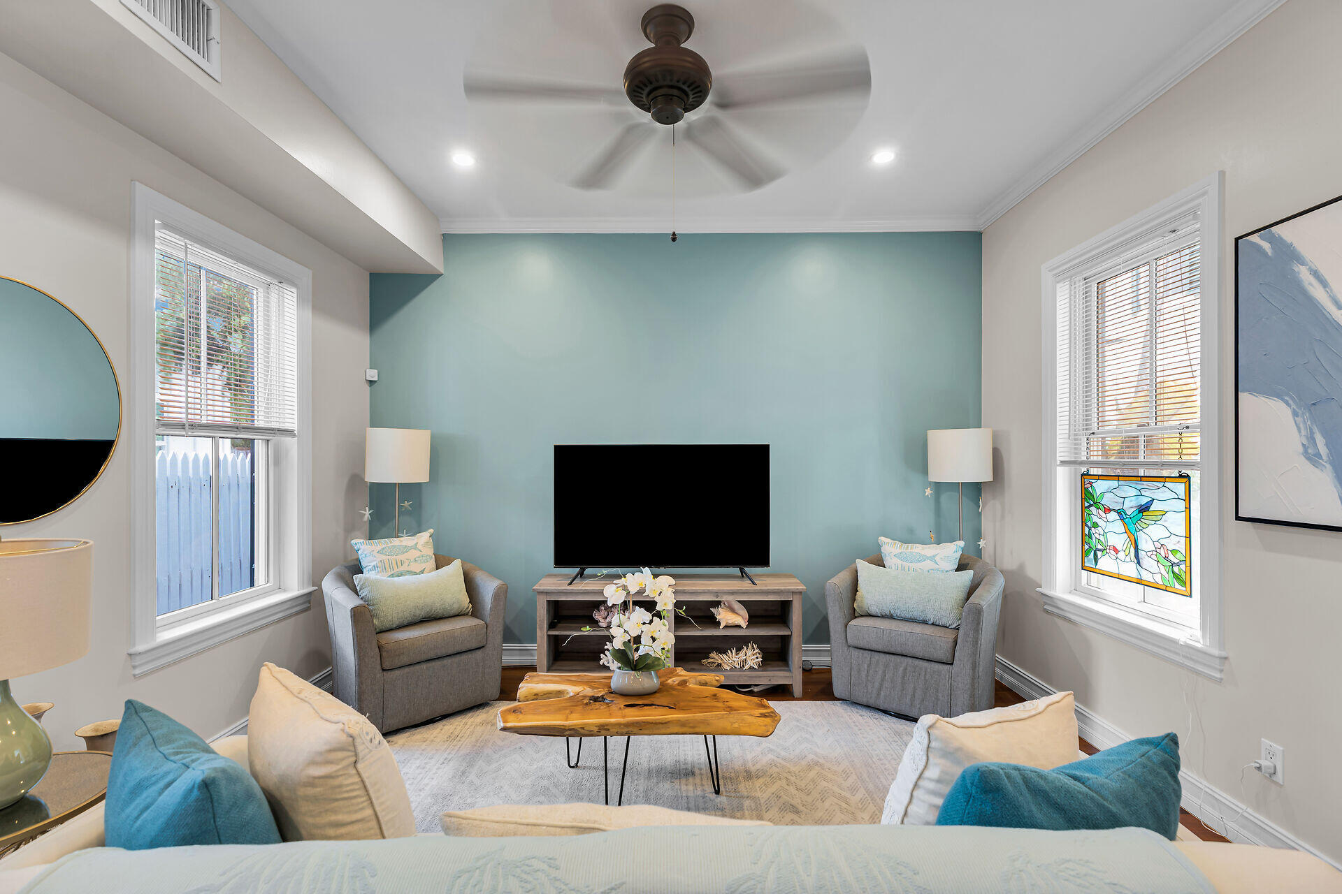 713 Emma Street, Unit 1 Key West, FL 33040 - Photo 10 of 42 a living room with furniture and a flat screen tv