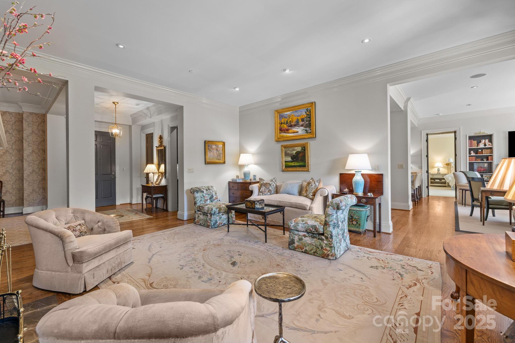 168 Cherokee Road Charlotte, NC 28207 - Photo 11 of 44 a living room with furniture and a wooden floor