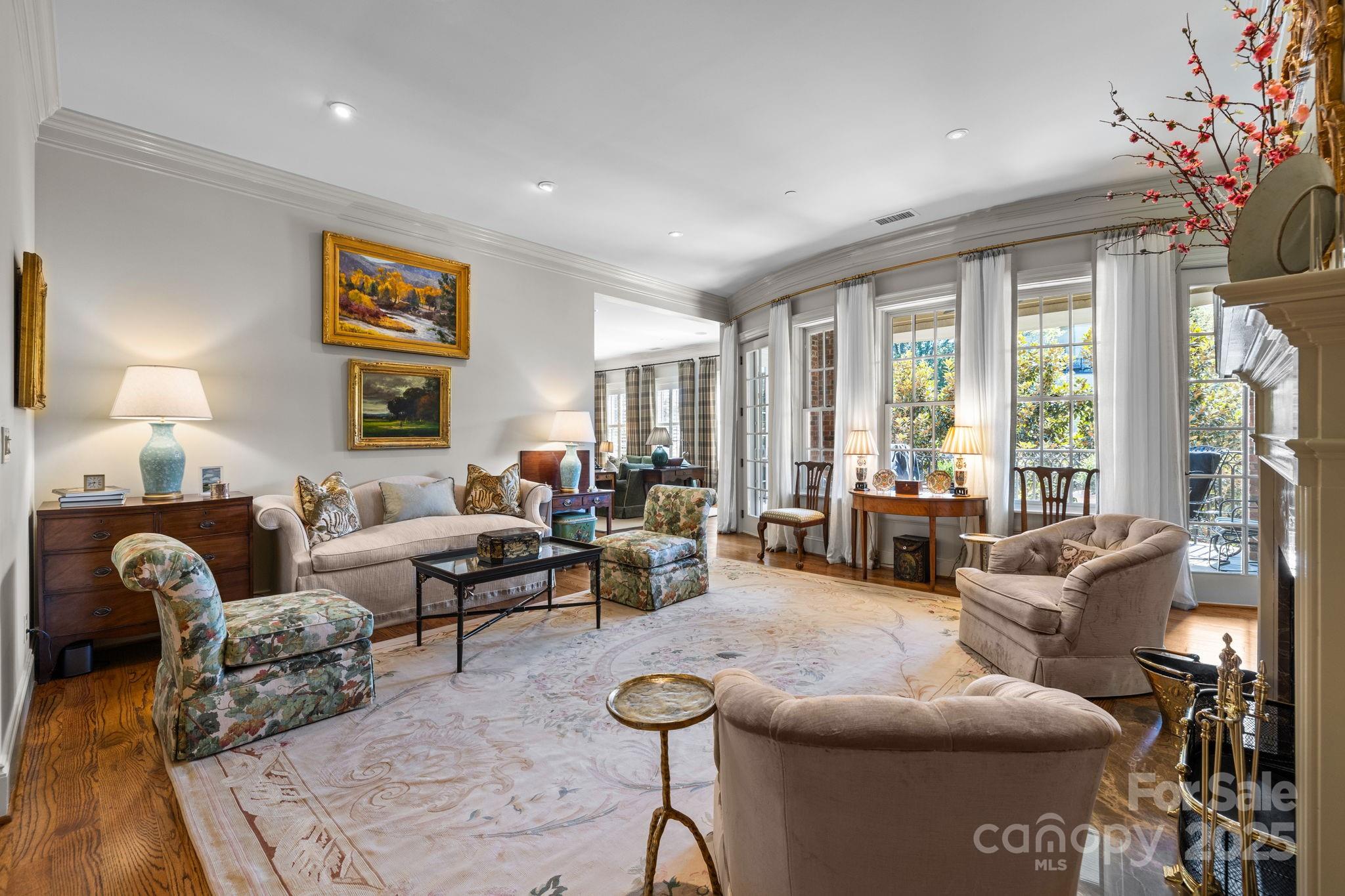 168 Cherokee Road Charlotte, NC 28207 - Photo 12 of 44 a living room with furniture and a large window