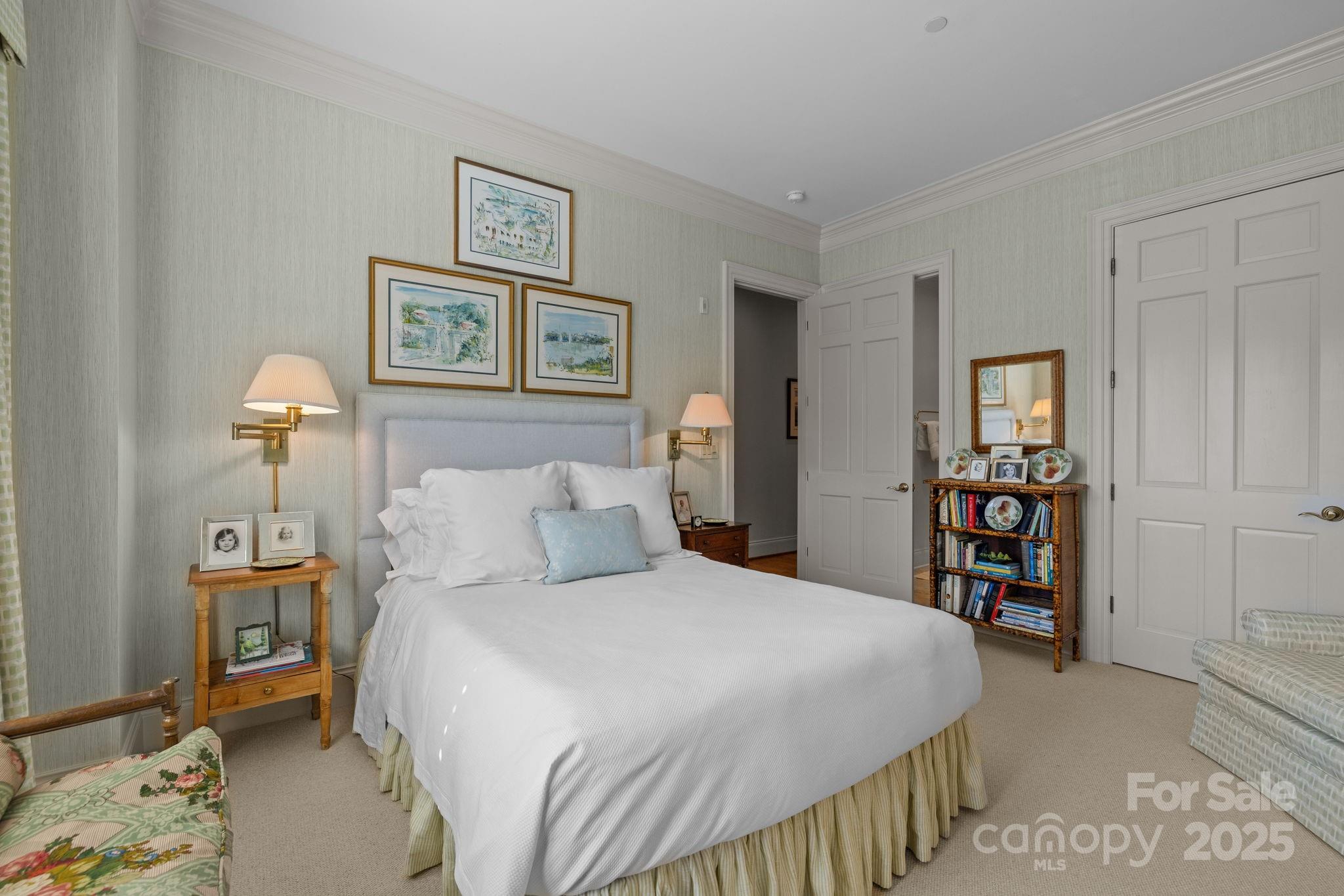 168 Cherokee Road Charlotte, NC 28207 - Photo 28 of 44 a bedroom with a bed and a view of bathroom