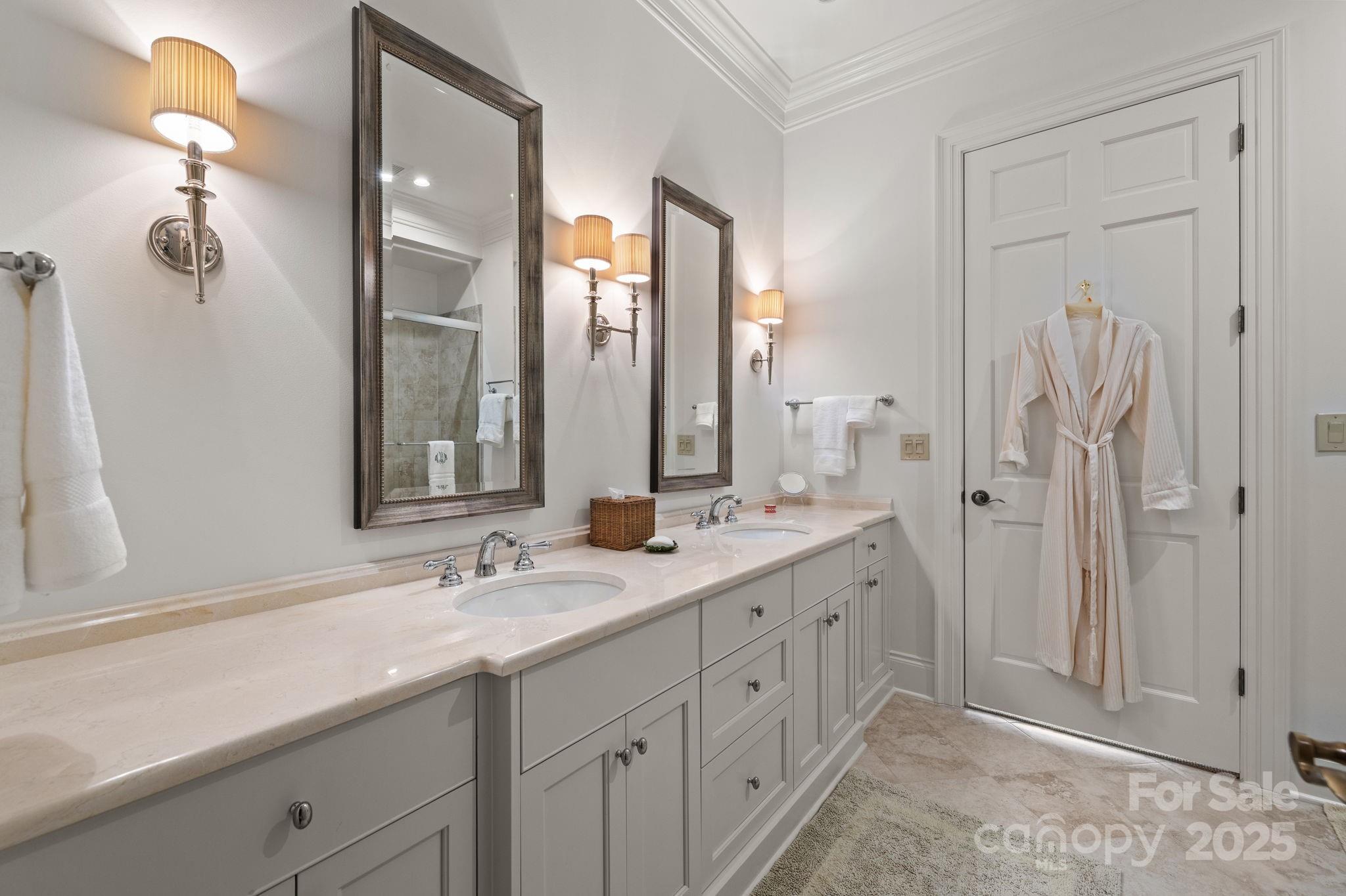 168 Cherokee Road Charlotte, NC 28207 - Photo 34 of 44 a bathroom with double vanity sink and a mirror