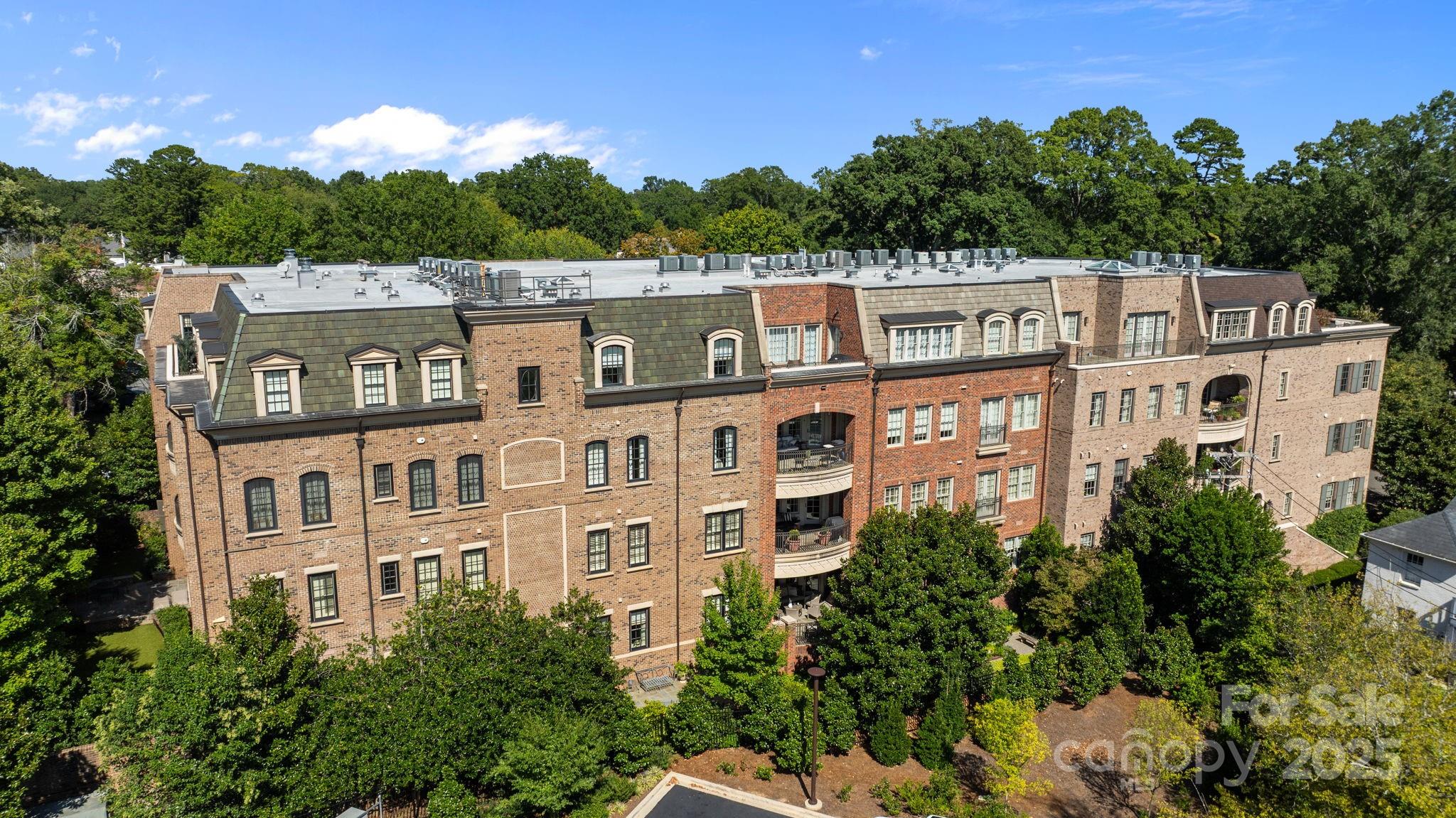 168 Cherokee Road Charlotte, NC 28207 - Photo 40 of 44 a front view of a house with a yard and garage