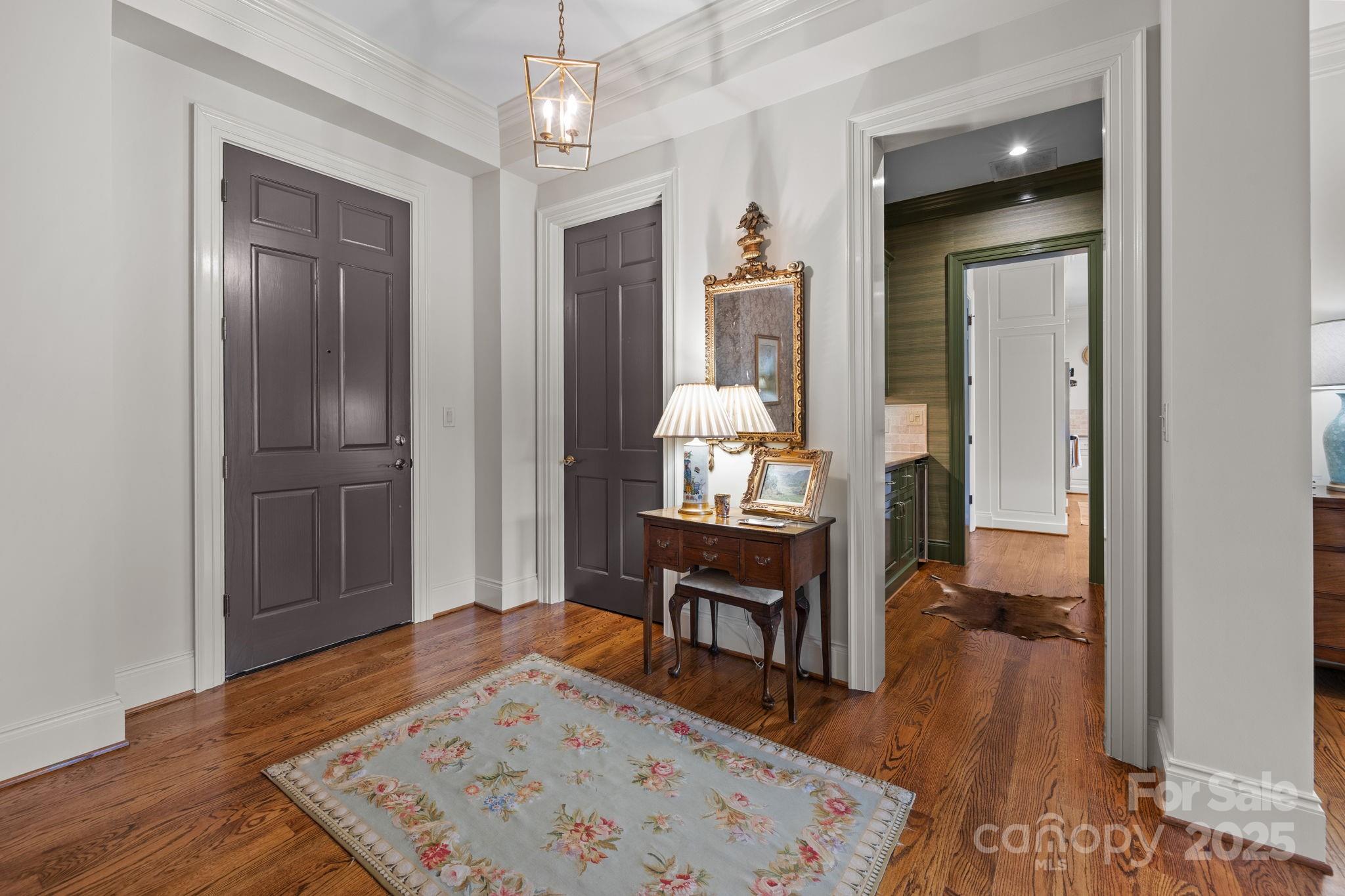 168 Cherokee Road Charlotte, NC 28207 - Photo 6 of 44 a living room with furniture and a wooden floor