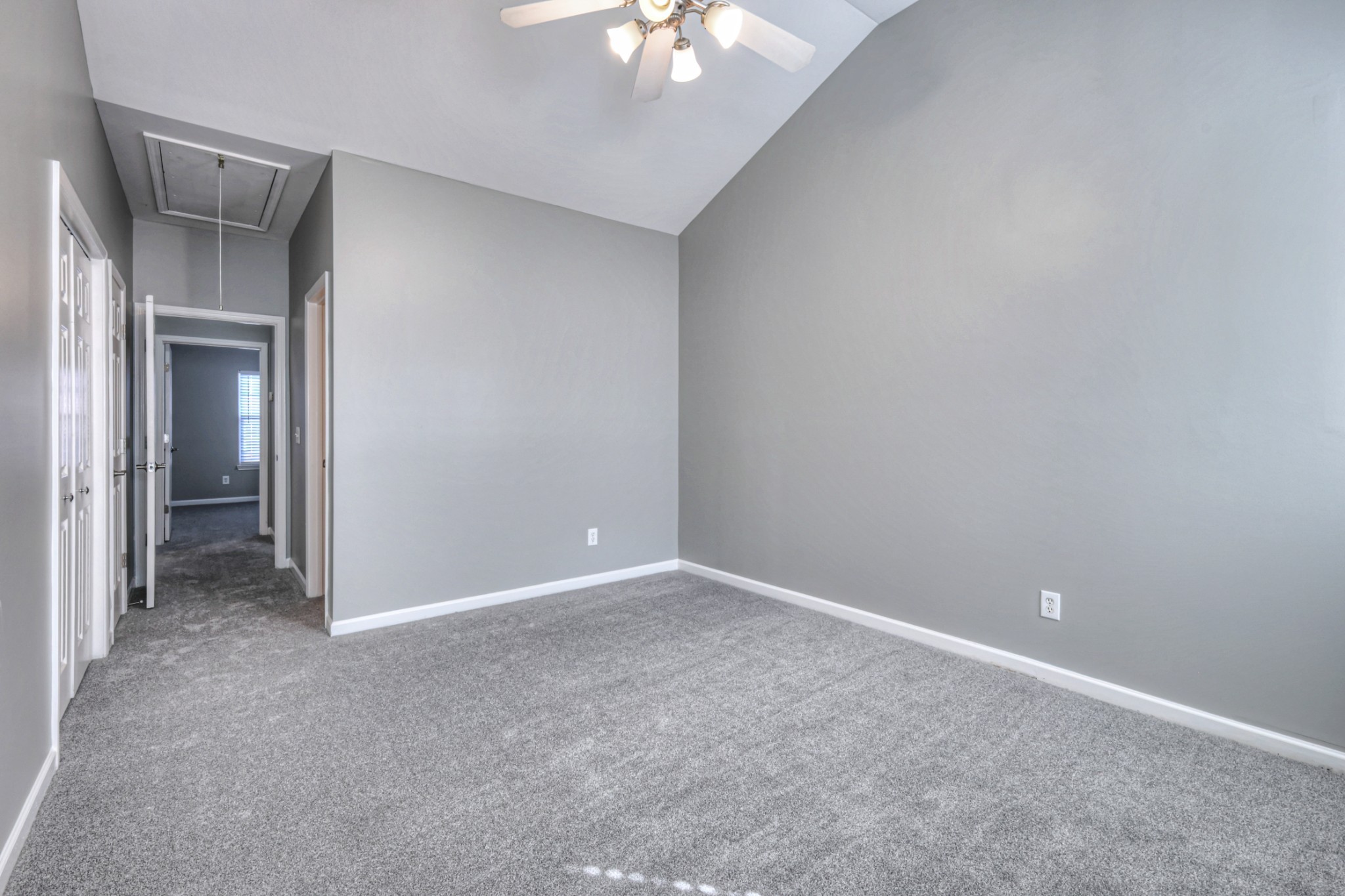 1101 Downs Boulevard, Unit 147 Franklin, TN 37064 - Photo 21 of 26 a view of an empty room with a chandelier fan