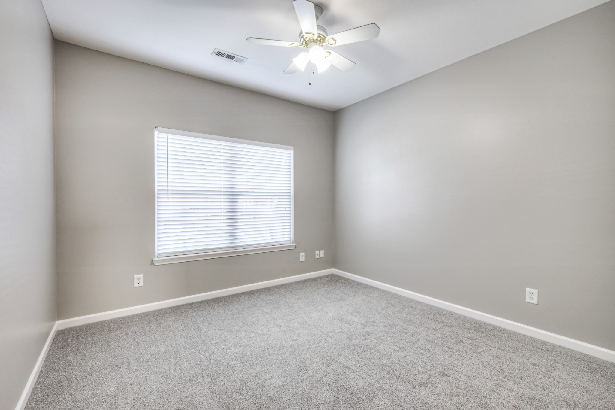 1101 Downs Boulevard, Unit 147 Franklin, TN 37064 - Photo 23 of 26 an empty room with a window and a fan