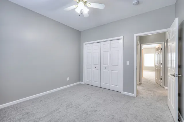 an empty room with a bathroom