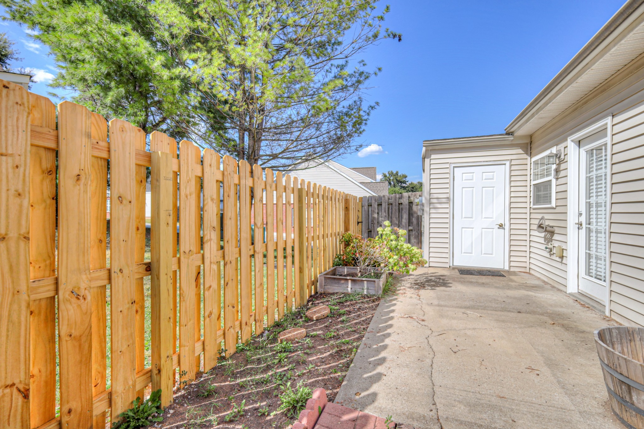 1101 Downs Boulevard, Unit 147 Franklin, TN 37064 - Photo 25 of 26 a view of a backyard with garden