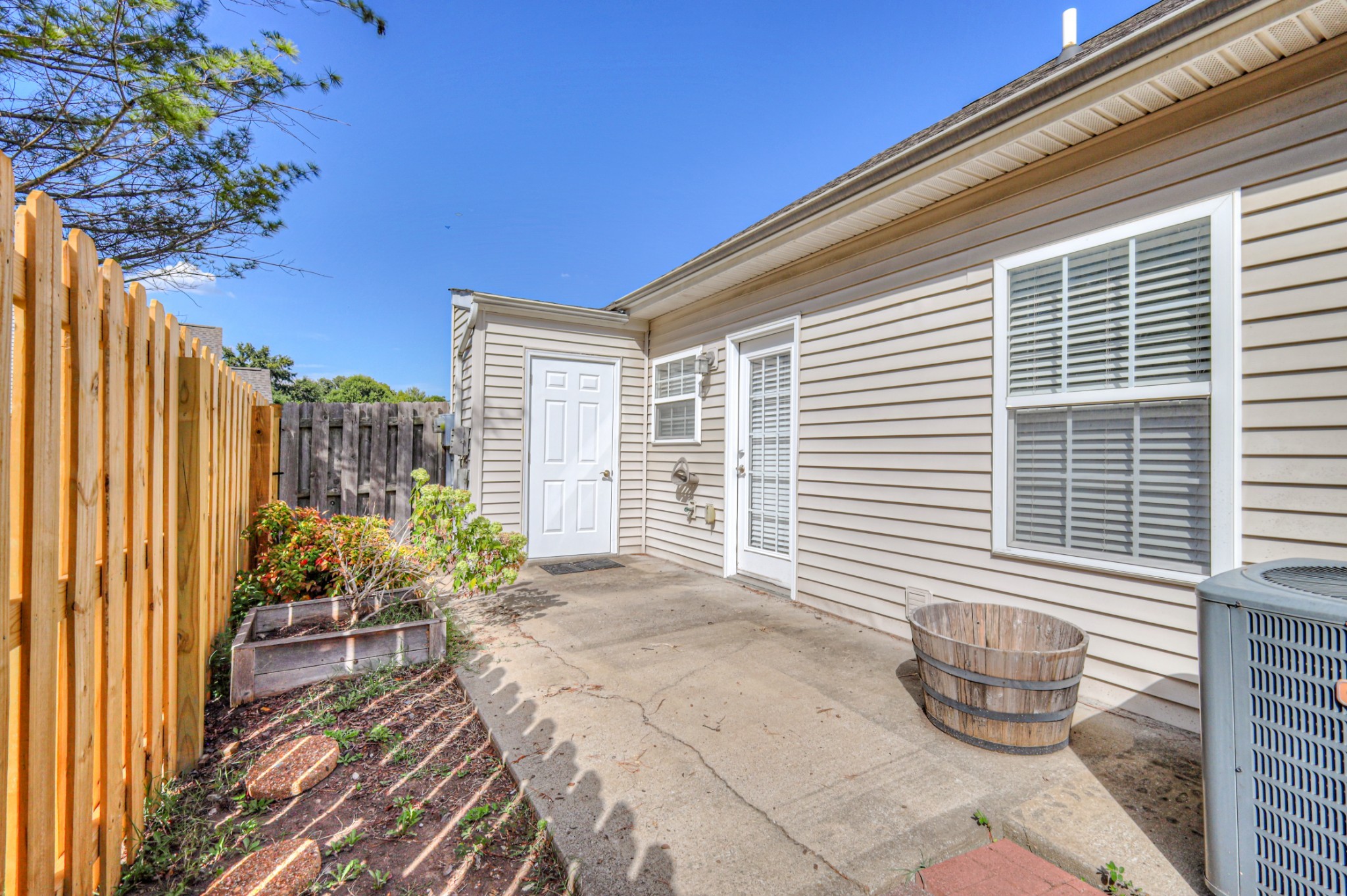 1101 Downs Boulevard, Unit 147 Franklin, TN 37064 - Photo 26 of 26 a front view of a house with outdoor seating