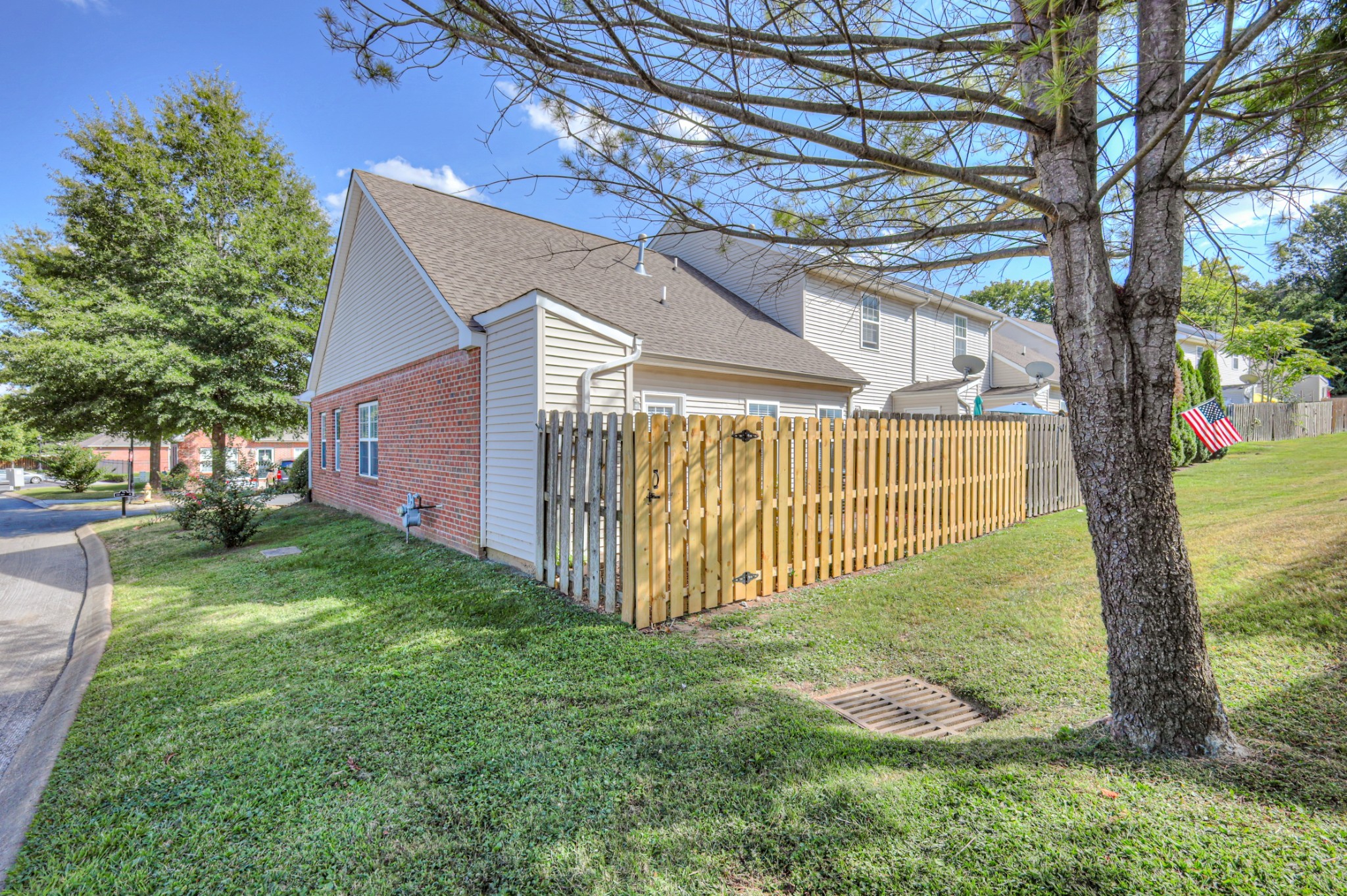 1101 Downs Boulevard, Unit 147 Franklin, TN 37064 - Photo 4 of 26 a front view of a house with garden