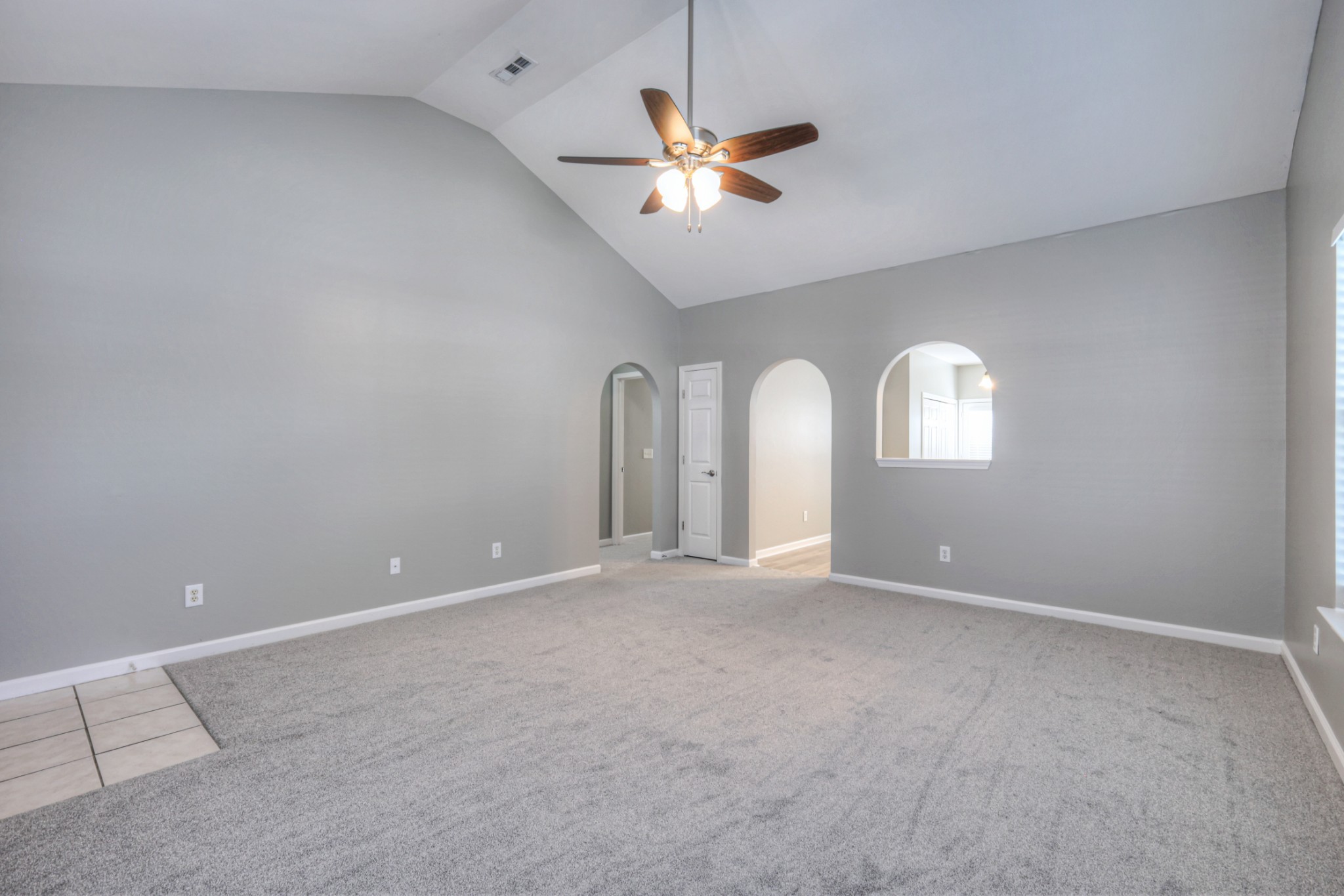 1101 Downs Boulevard, Unit 147 Franklin, TN 37064 - Photo 6 of 26 an empty room with fan and windows