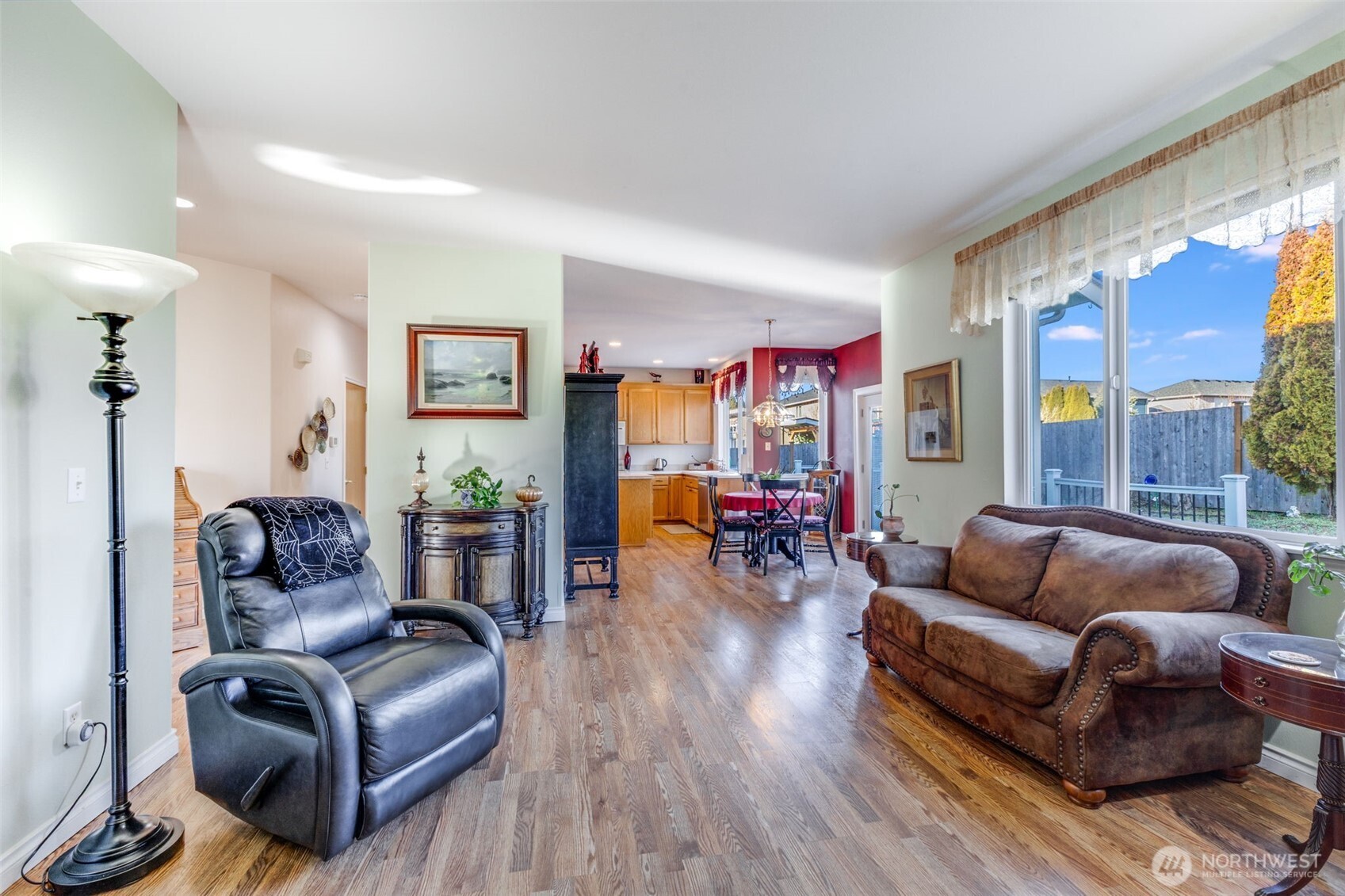 5103 80th Street Southwest Lakewood, WA 98499 - Photo 11 of 33 a living room with furniture and a wooden floor