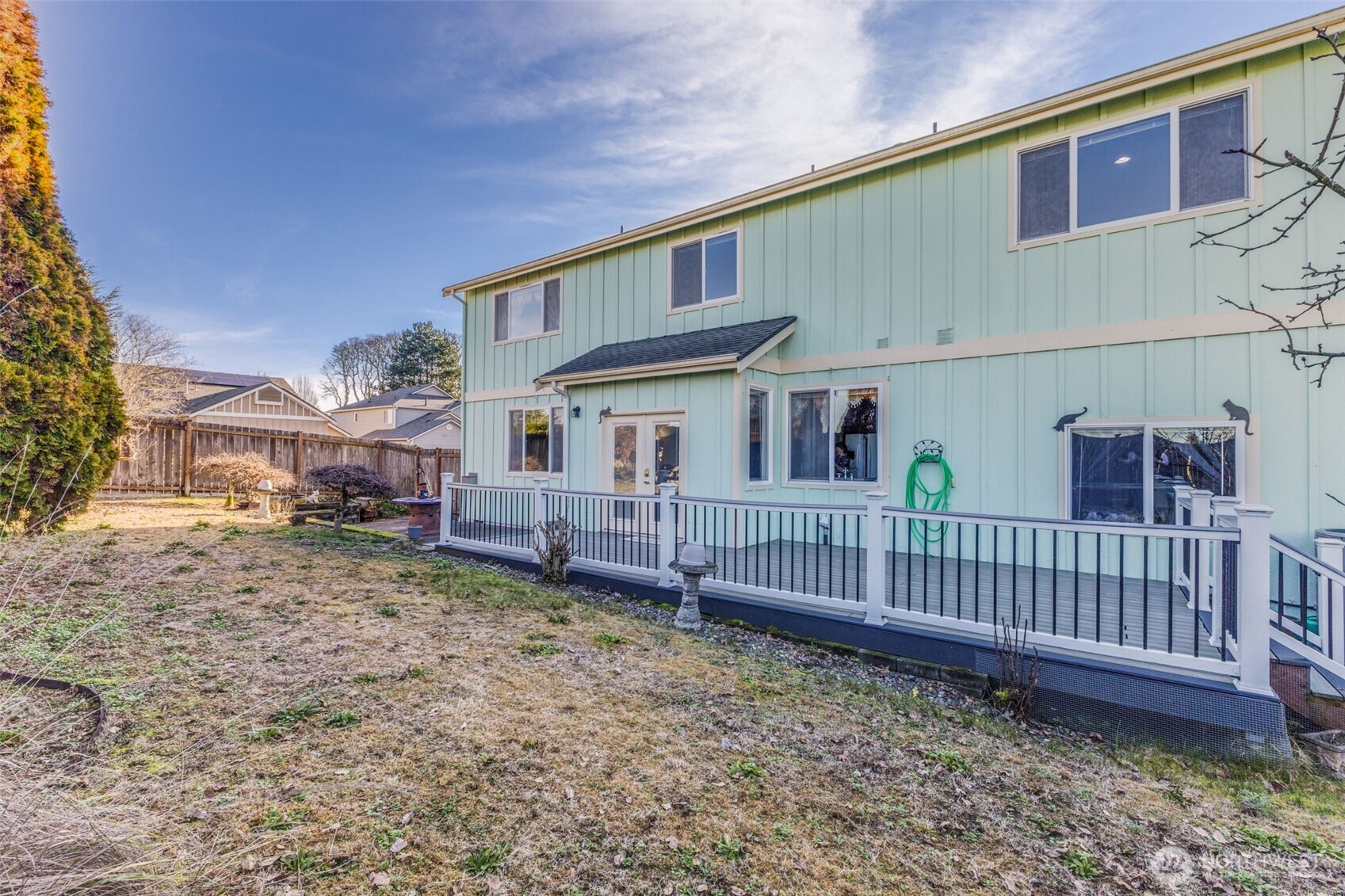 5103 80th Street Southwest Lakewood, WA 98499 - Photo 31 of 33 a view of a house with wooden fence