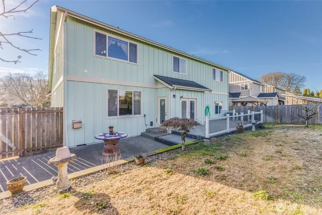 a backyard of a house with seating space