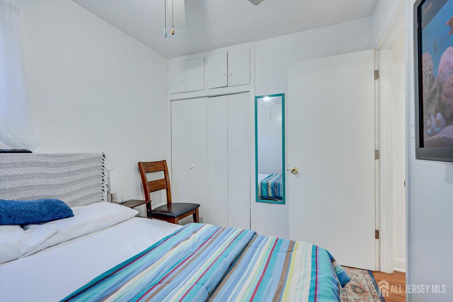 15 Markham Road Edison, NJ 08817 - Photo 25 of 32 a bedroom with a bed and a window