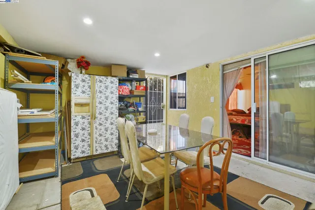 a view of kitchen with cabinets and wooden floor