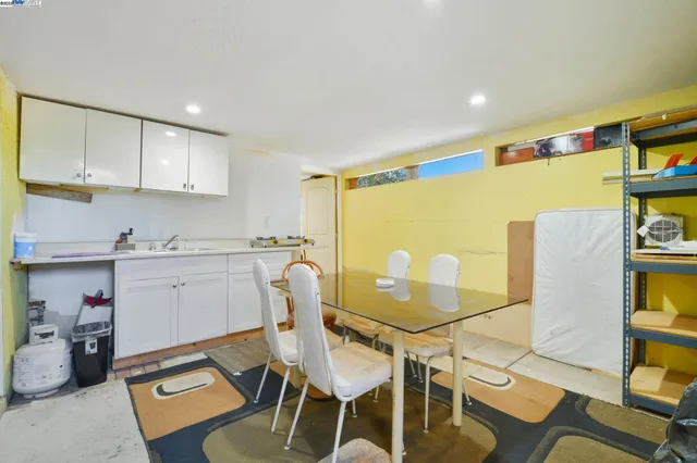 a room with furniture and a flat screen tv