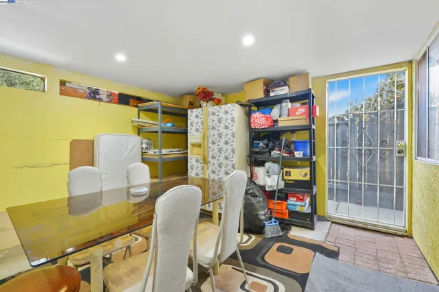 a view of kitchen with cabinets and wooden floor