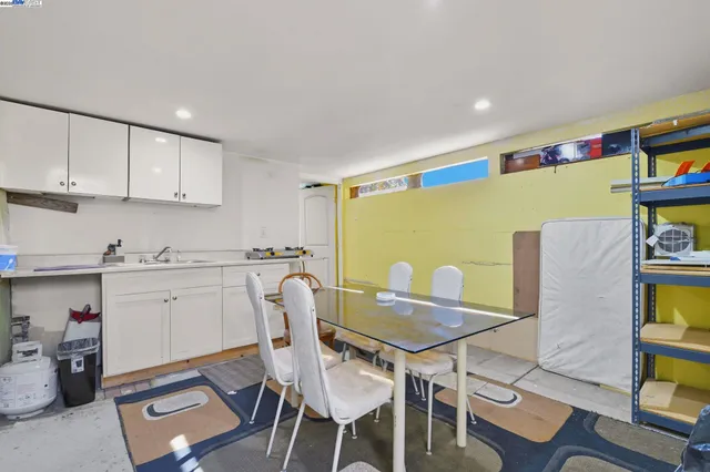 a room with furniture and a flat screen tv