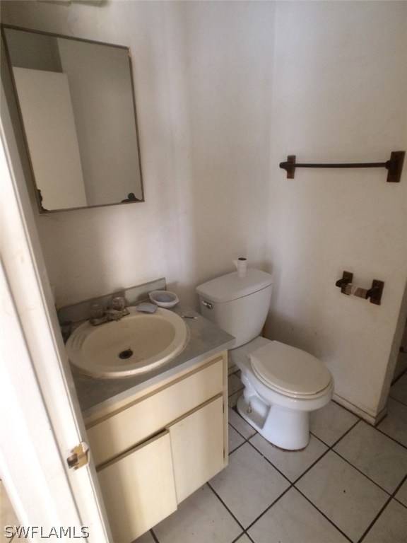 18250 Apple Road Fort Myers, FL 33967 - Photo 13 of 19 a bathroom with a sink and a toilet