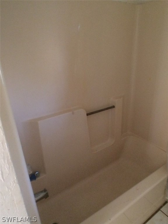 18250 Apple Road Fort Myers, FL 33967 - Photo 14 of 19 a bathroom with a bathtub