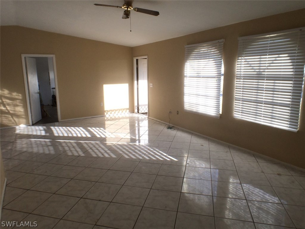18250 Apple Road Fort Myers, FL 33967 - Photo 16 of 19 a view of an empty room with a window
