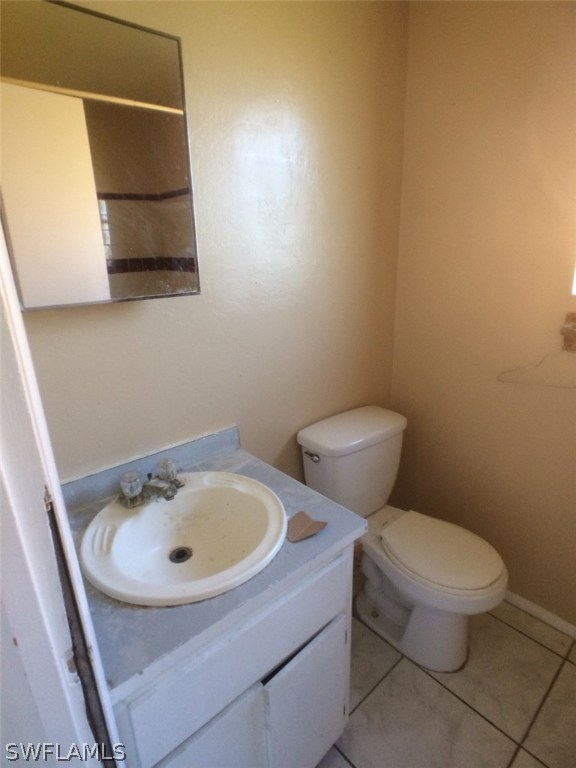 18250 Apple Road Fort Myers, FL 33967 - Photo 9 of 19 a bathroom with a toilet and sink