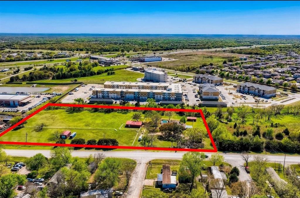 4260 Lasater Road Balch Springs, TX 75181 - Photo 1 of 33 a view of a city with lots of trees and houses